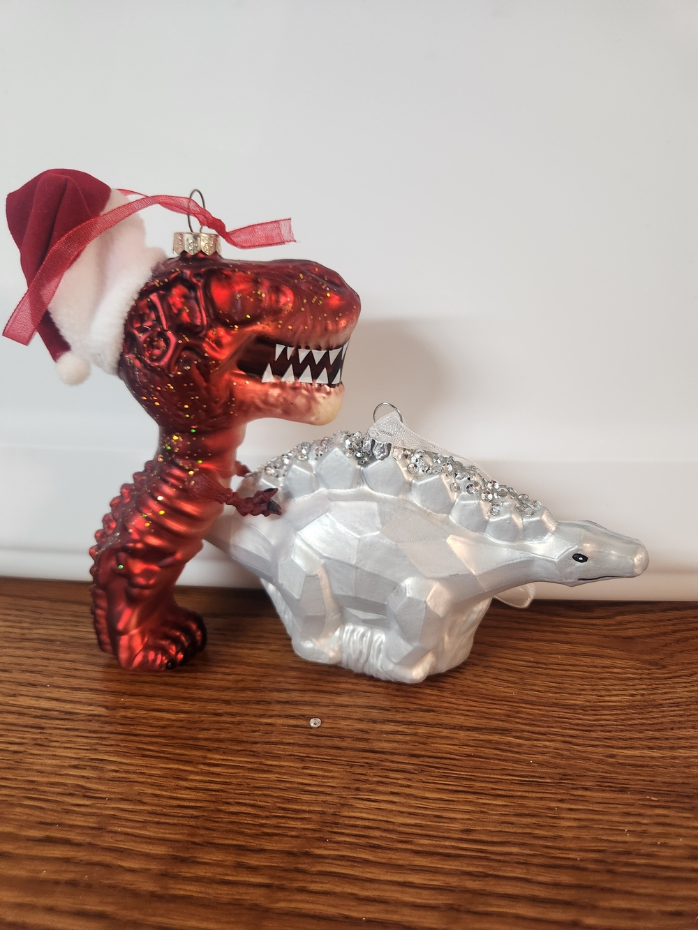 Festive Red T-Rex and Silver Stegosaurus Holiday Dino Ornament Set